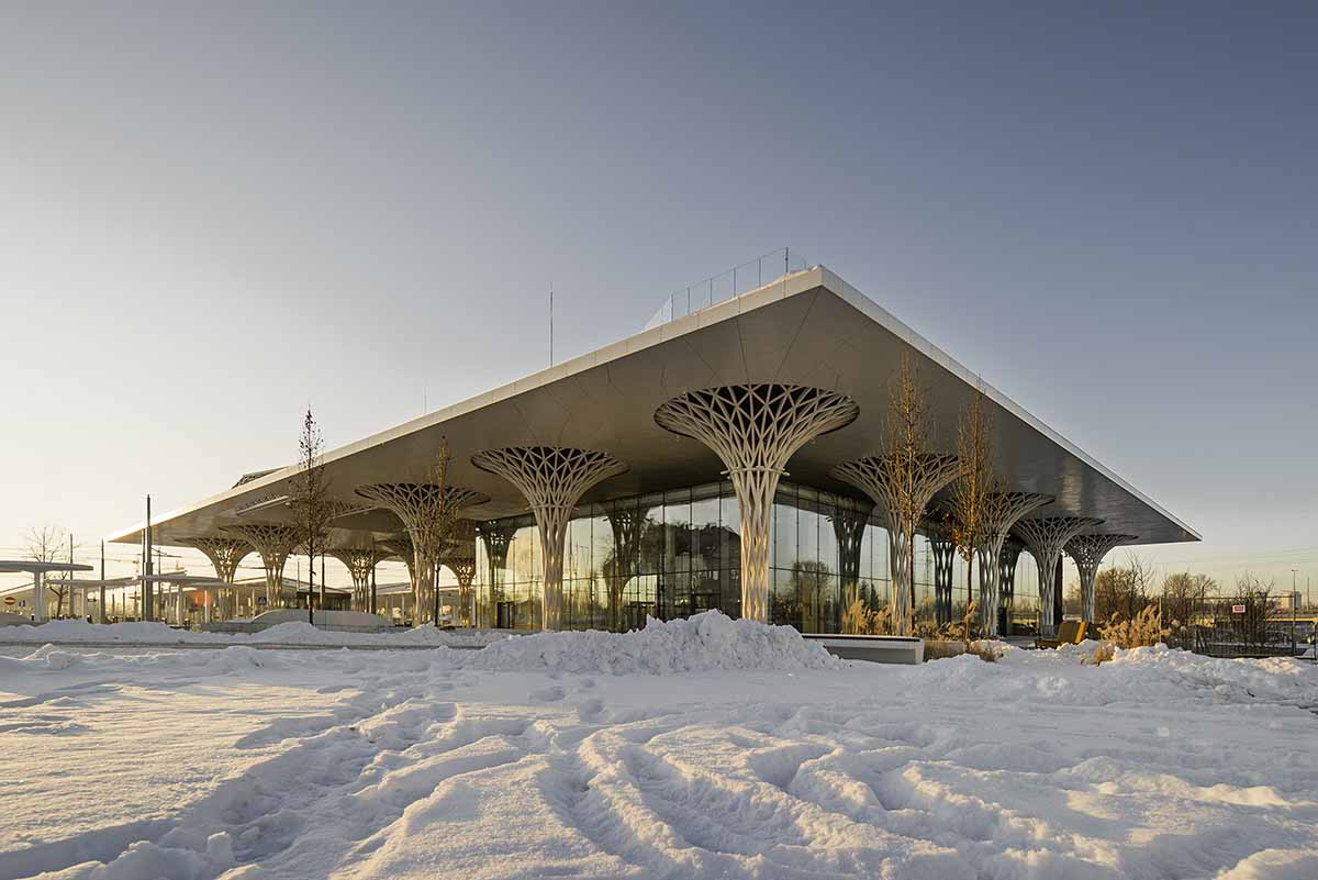 Organic tree-like columns are combined with linear canopy for Metropolitan Station in Lublin 
