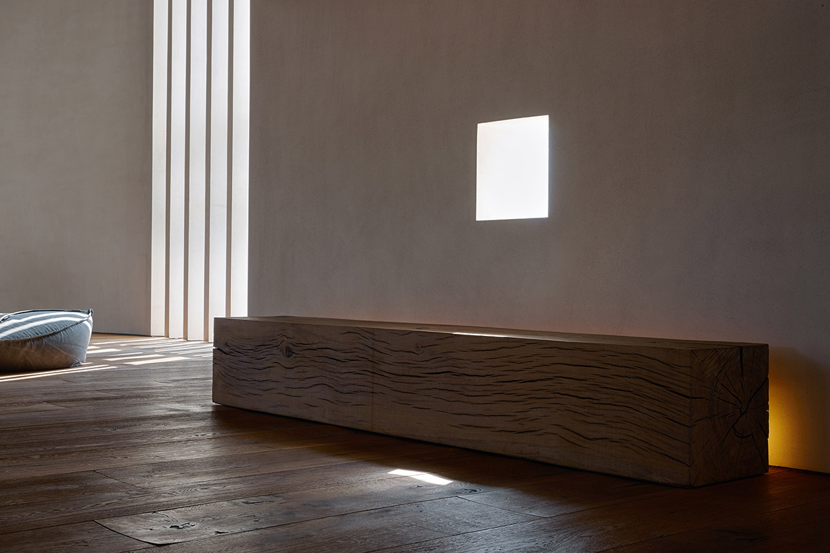 ZMY Design creates earth-toned interiors for a woodwork enthusiast’s house in Fujian, China