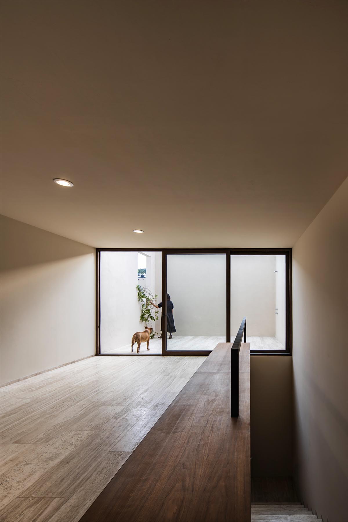 Sabino 10 residence by Editorial features a solid façade with hermetic volumes in Mexico