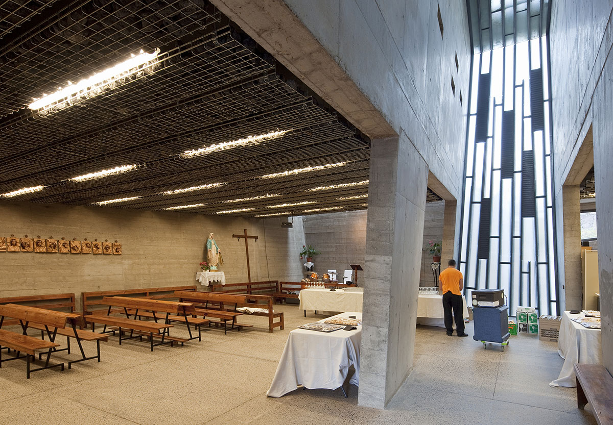 Menis Arquitectos designs church and community centre in Spain with four massive concrete volumes 