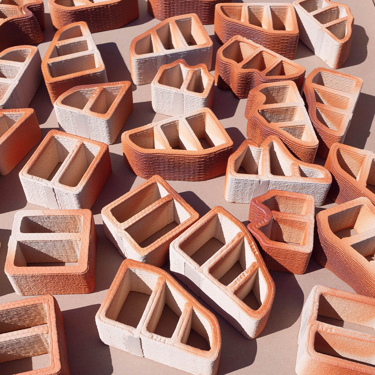 Studio RAP creates façade featuring bespoke 3D-printed ceramic tiles and bricks