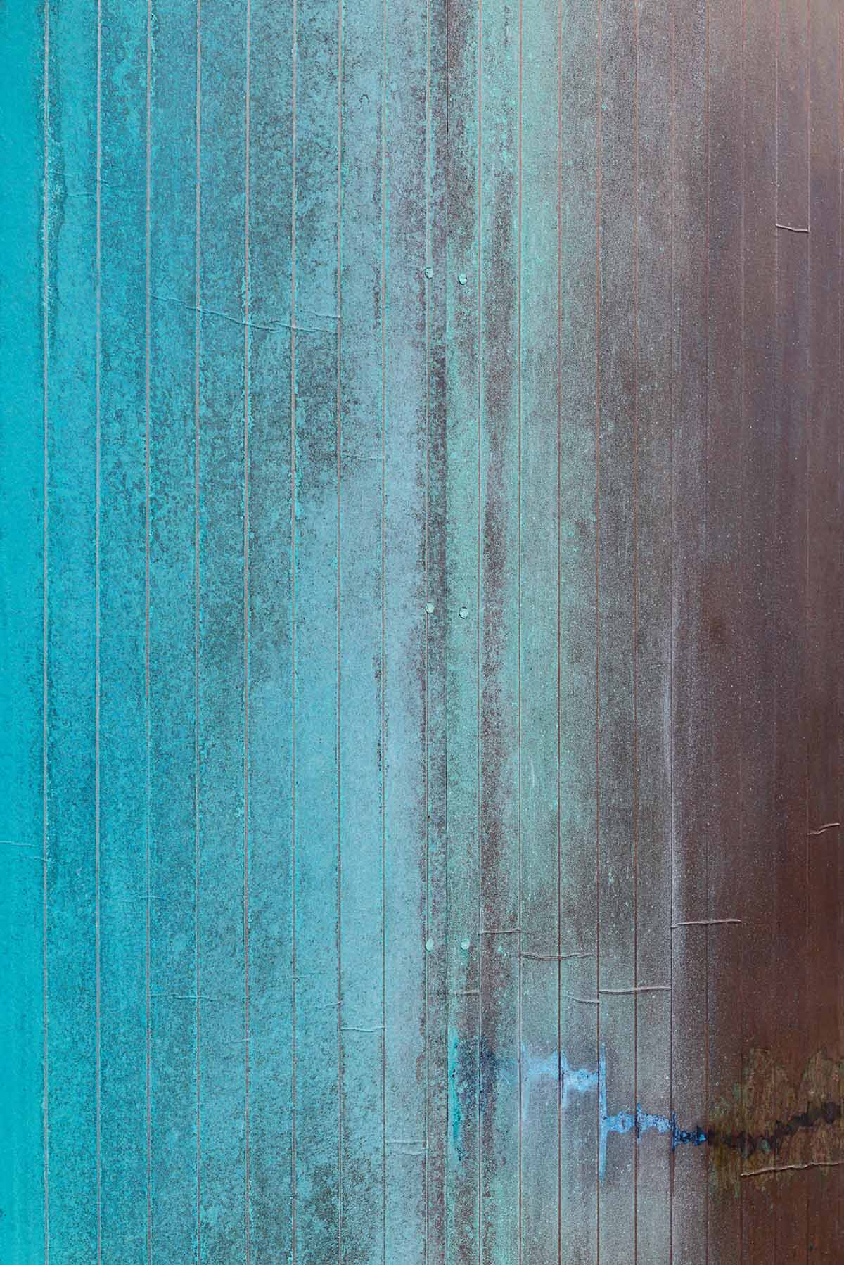 The one-meter-deep cafe invites customers with its patina color on its facade in Kyoto
