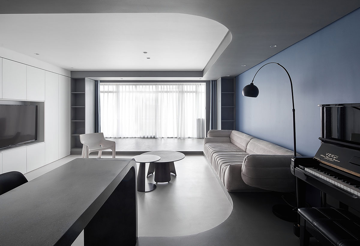 XIGO STUDIO creates gray and blue-colored interiors for apartment in Beijing 
