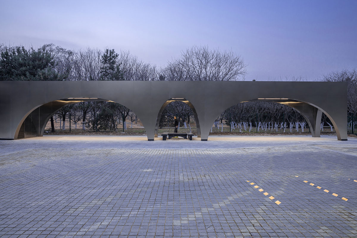TEMP designs runner's station with stainless steel arcades in Beijing Olympic Forest Park
