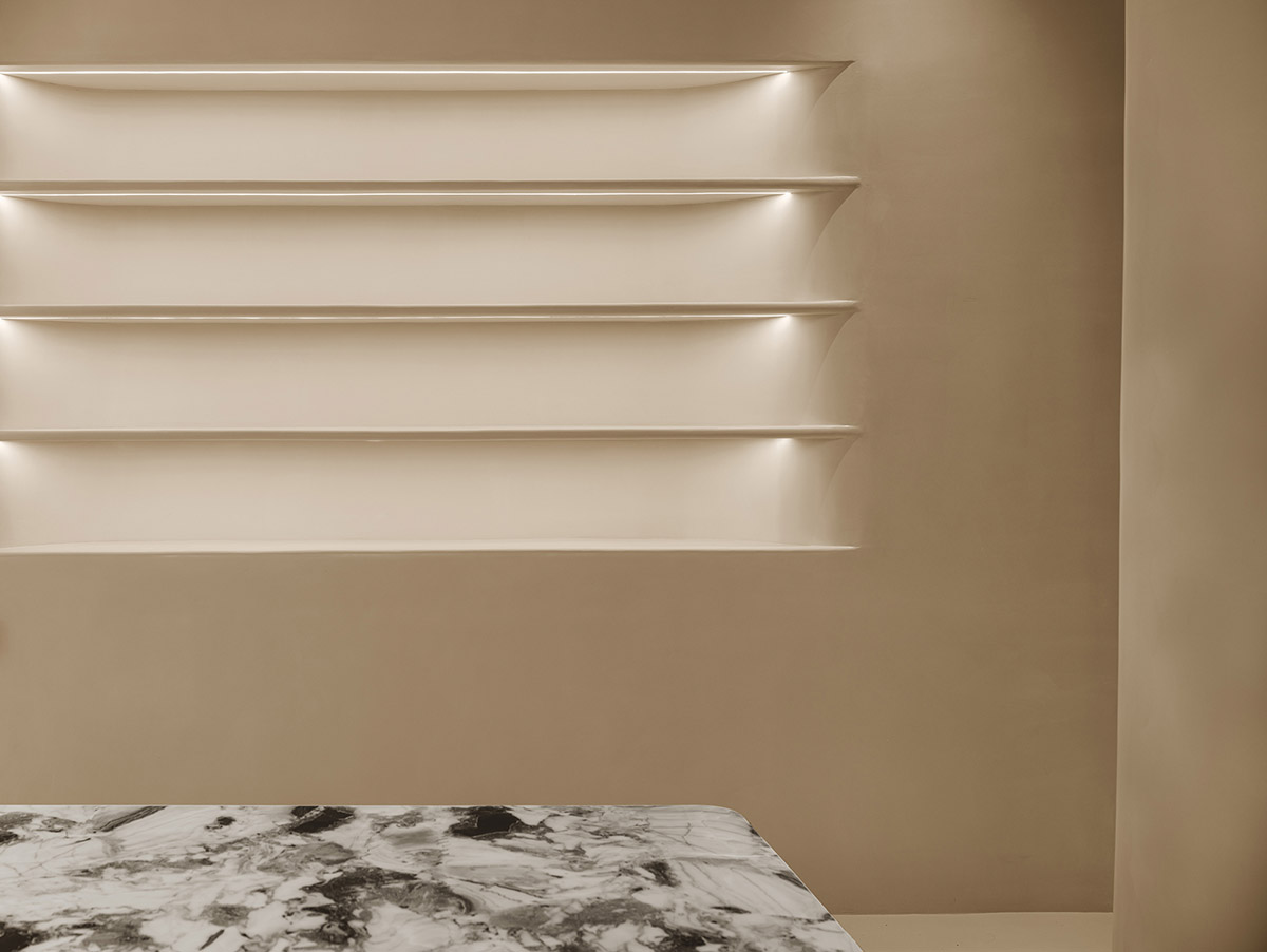 Undulating and smooth walls form this retail store by Panda NANA in Jinan, China