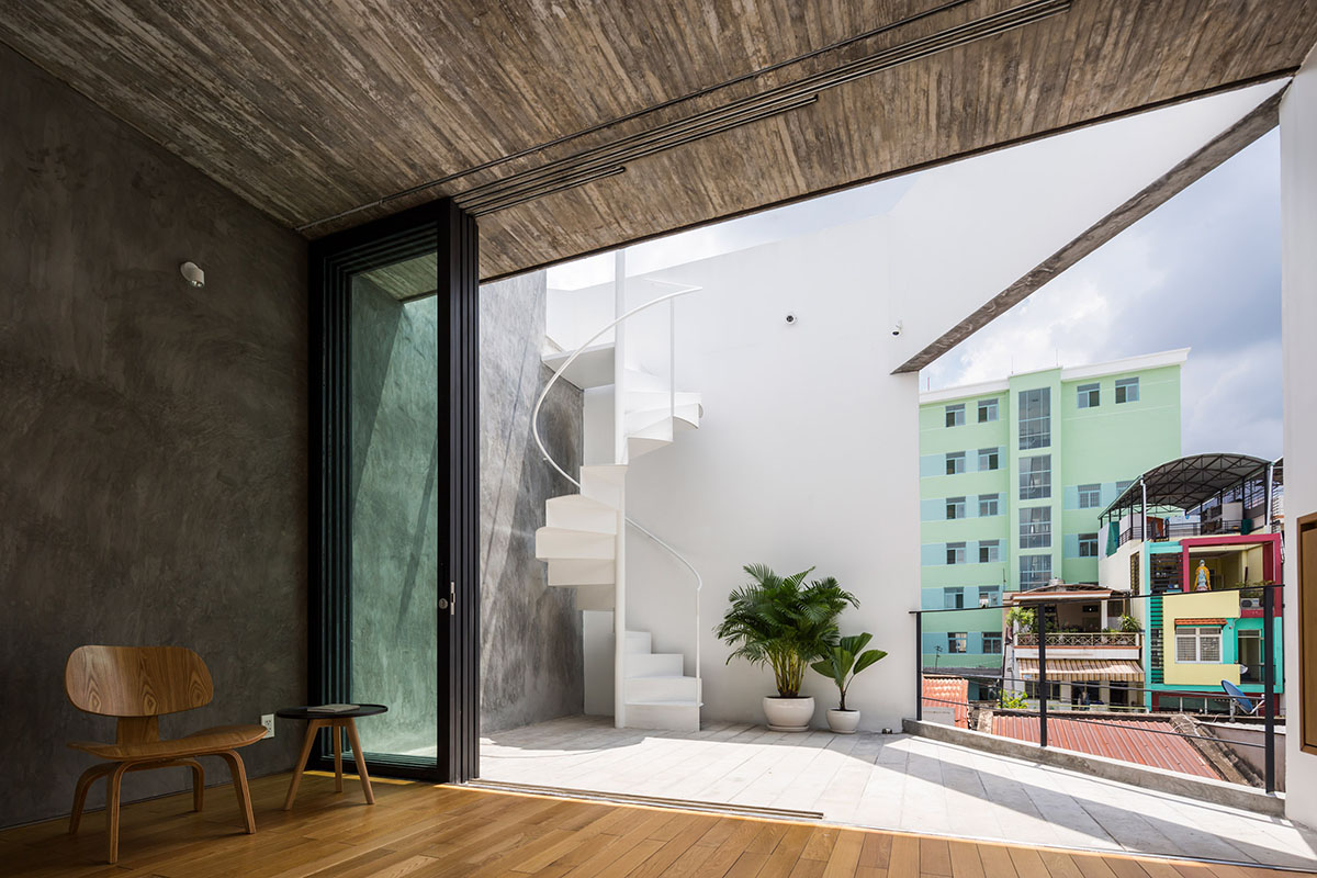 Sanuki Daisuke Architects' multifaceted concrete house features more open spaces in Vietnam