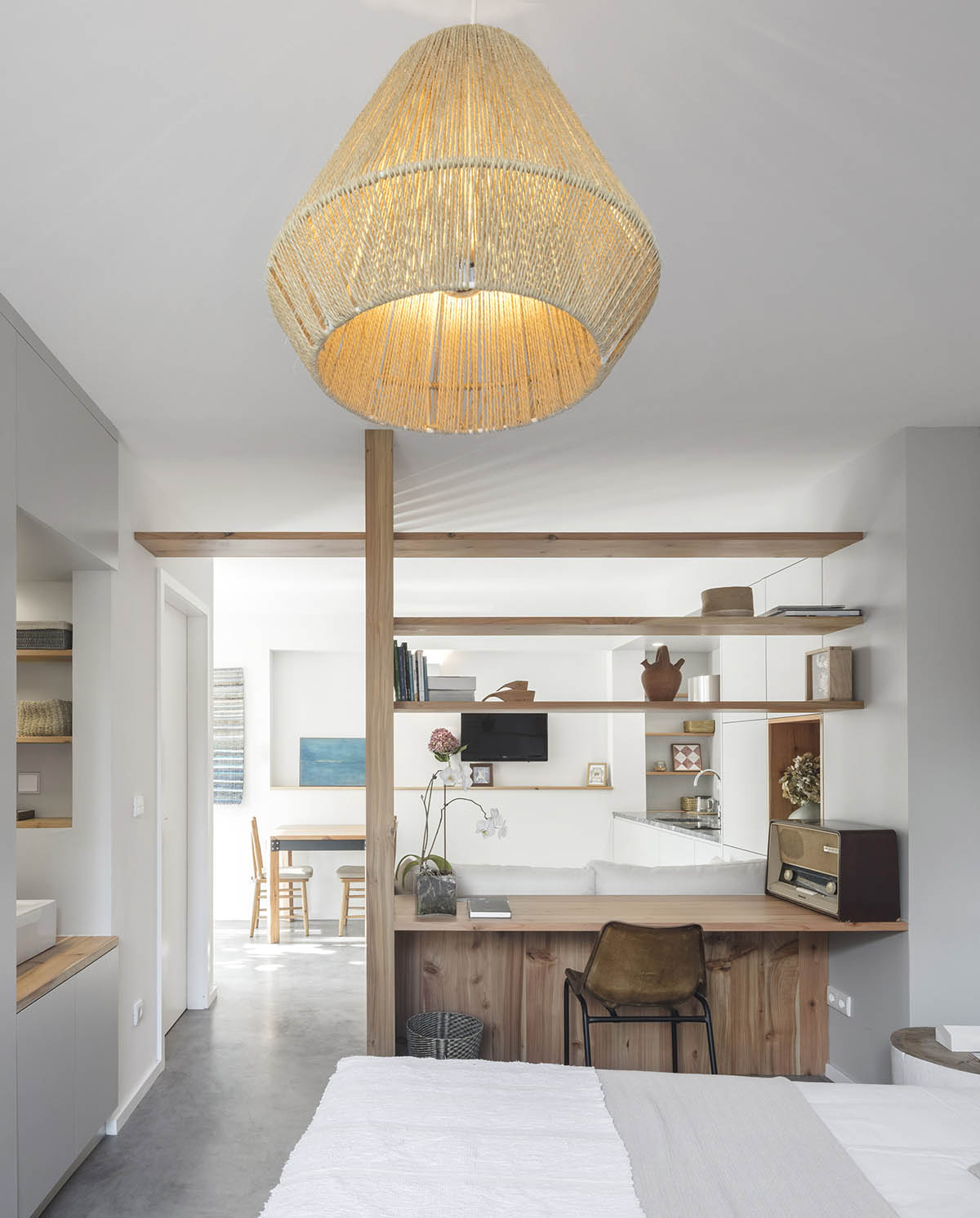 Mezzo Atelier transforms old barn into guesthouses featuring different hues of pink