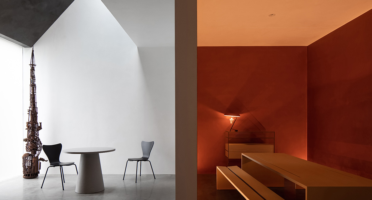 JG Phoenix creates paint-like interiors harmonized with geometric cut-outs for showroom in China