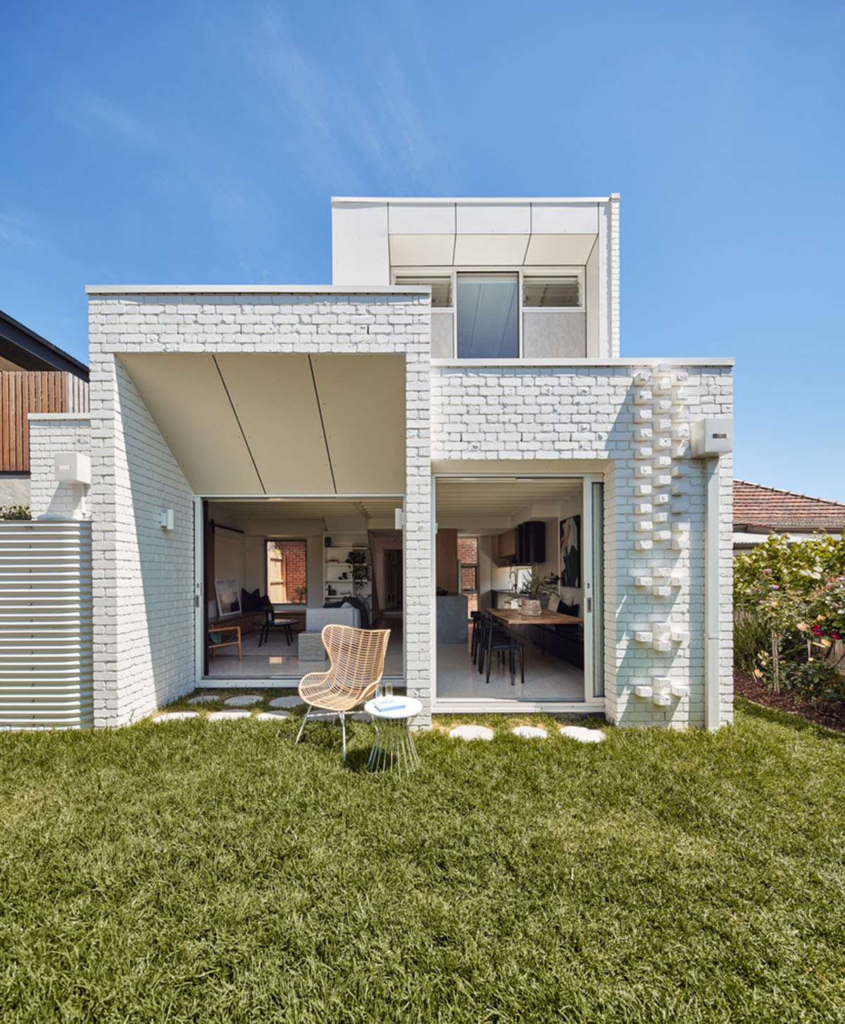 Atelier Red+Black built white Cascade House that features different patterns of brick in Melbourne