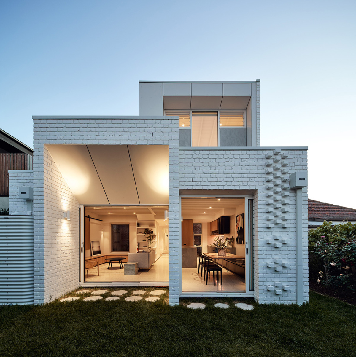 Atelier Red+Black built white Cascade House that features different patterns of brick in Melbourne