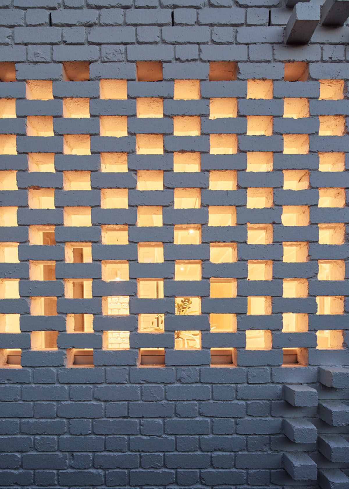 Atelier Red+Black built white Cascade House that features different patterns of brick in Melbourne