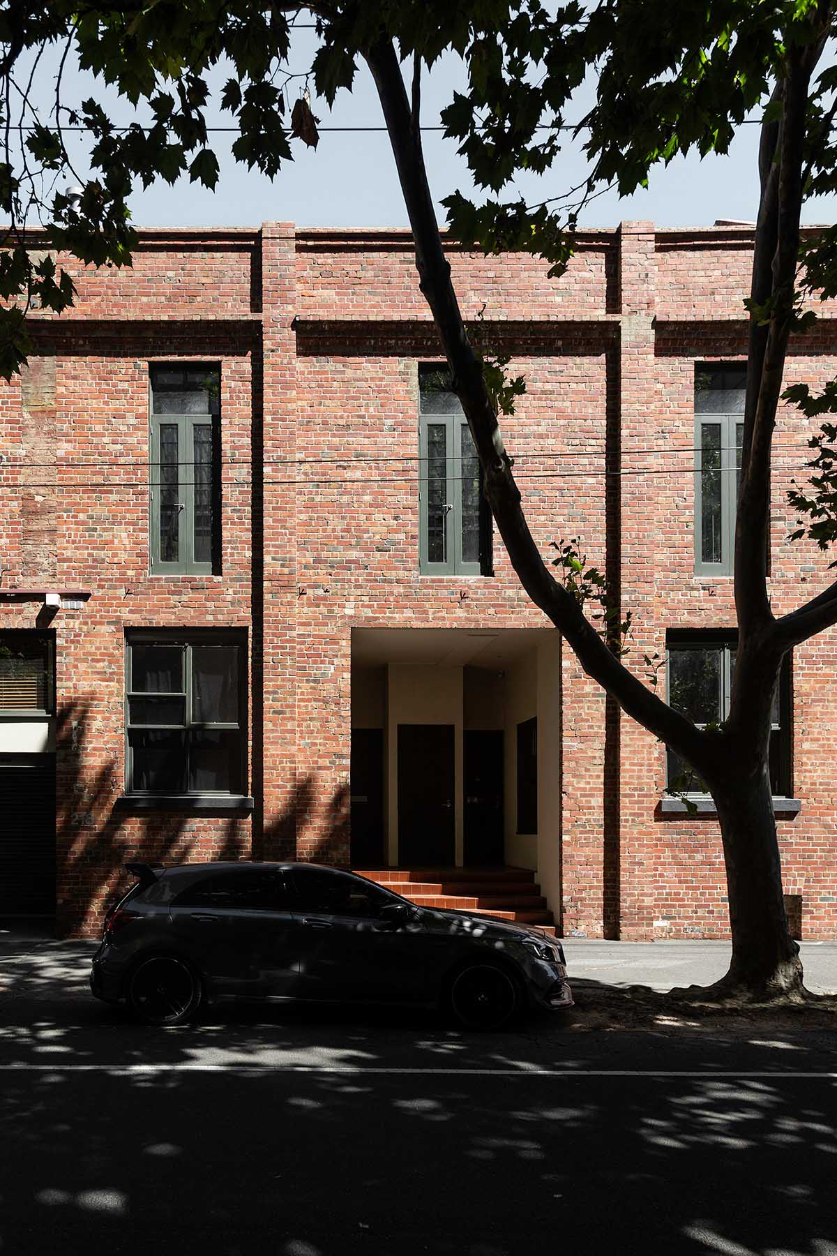 Splinter Society transforms former chocolate factory warehouse flat with earthy and rustic tones