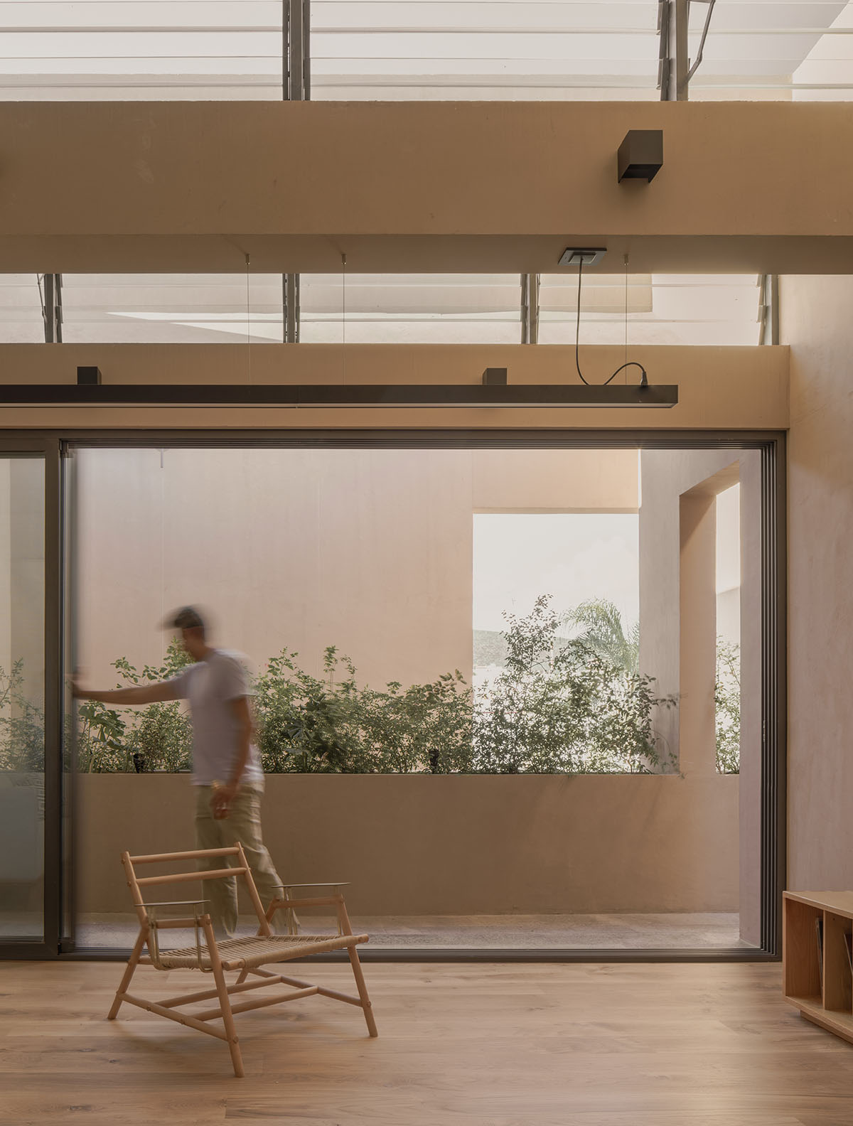 Taller Segovia Molina enriches beige Casa Aguilar with interior patios and an abundance of light