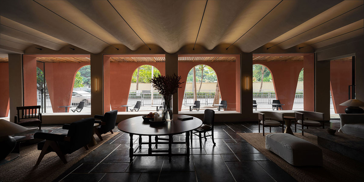 Fusion Design reveals seaside resort featuring red-colored and arched façade in Shenzhen