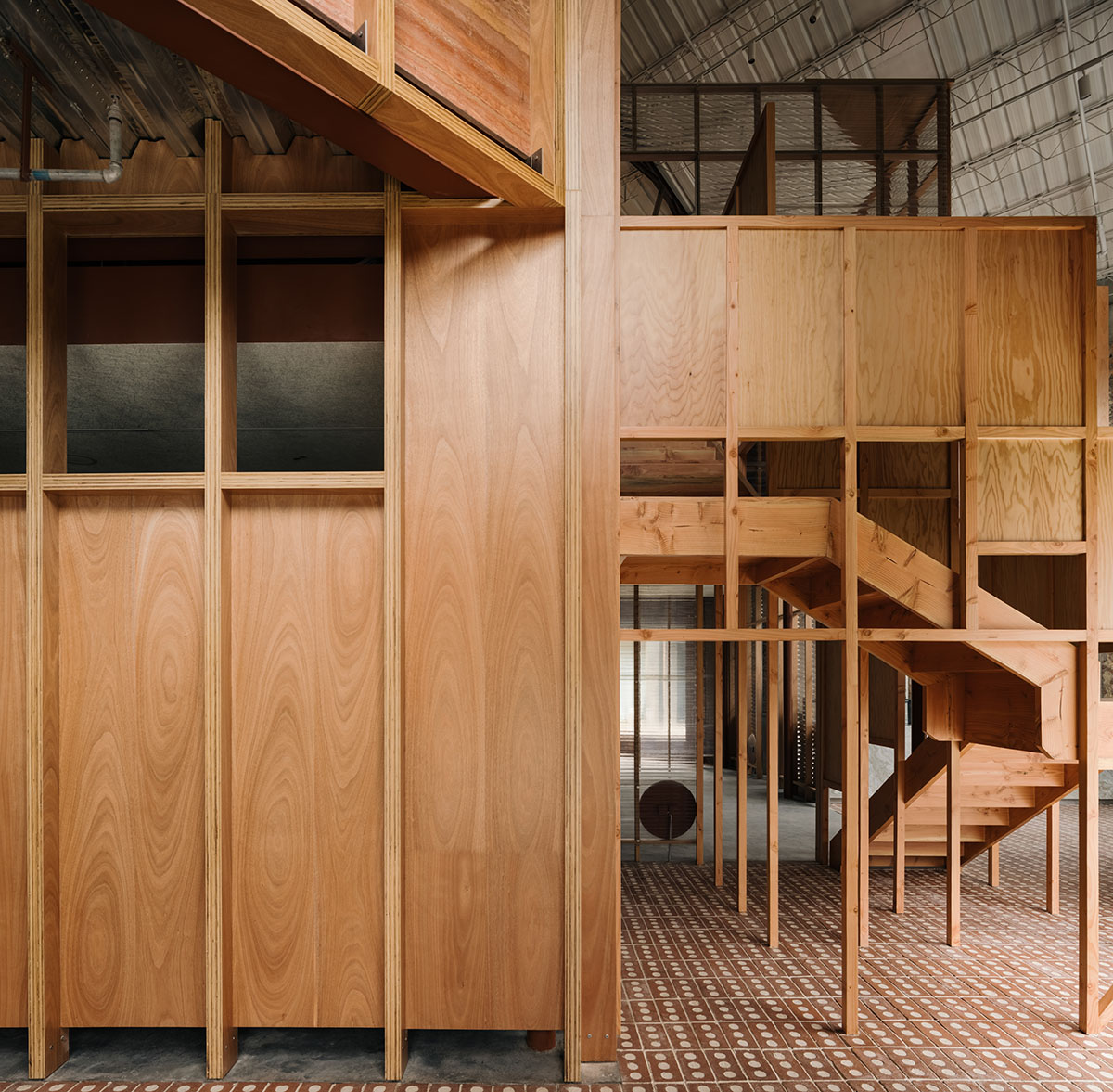 Atelier tao+c creates a crystal-like showroom with two stacked timber volumes in Beijing 
