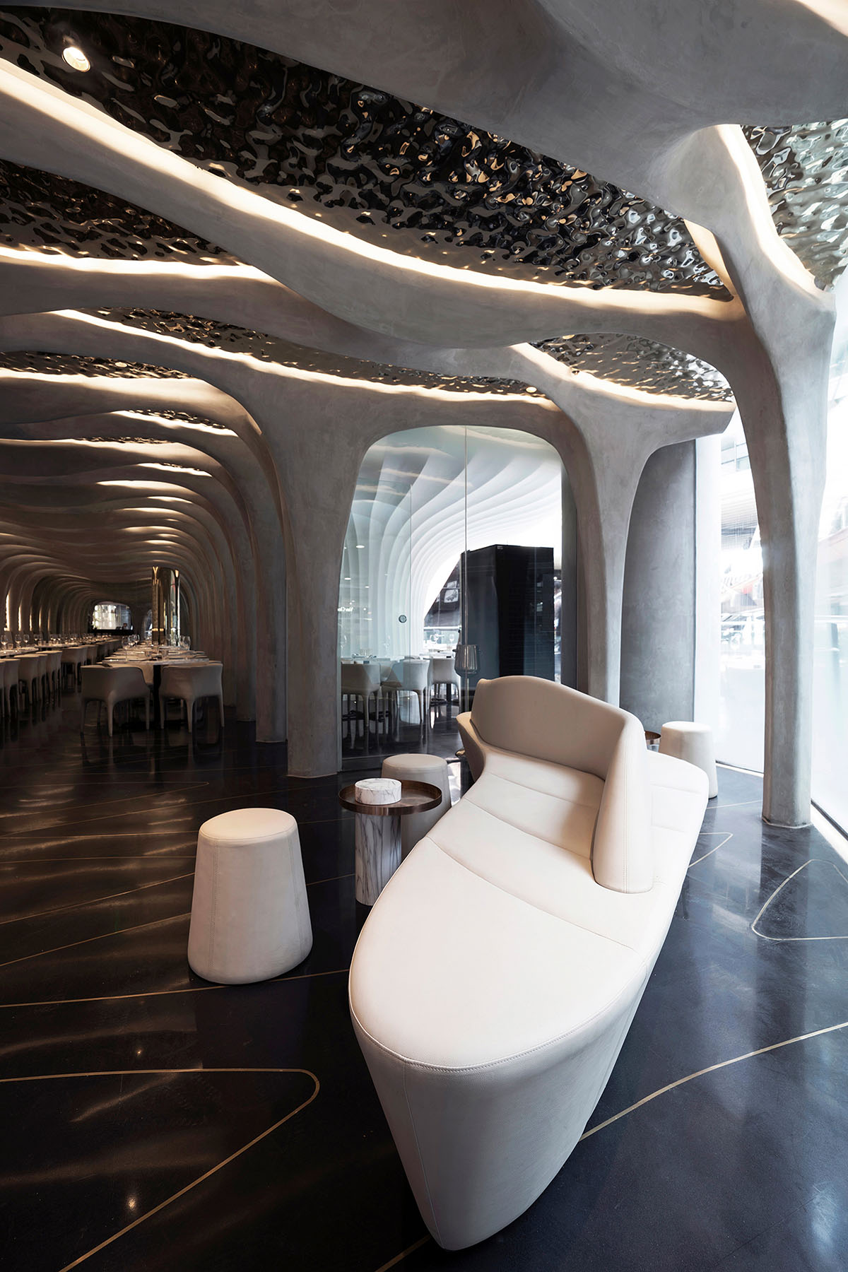 CAA Architects creates flower-like double-deck terrace in the interior of restaurant in Beijing