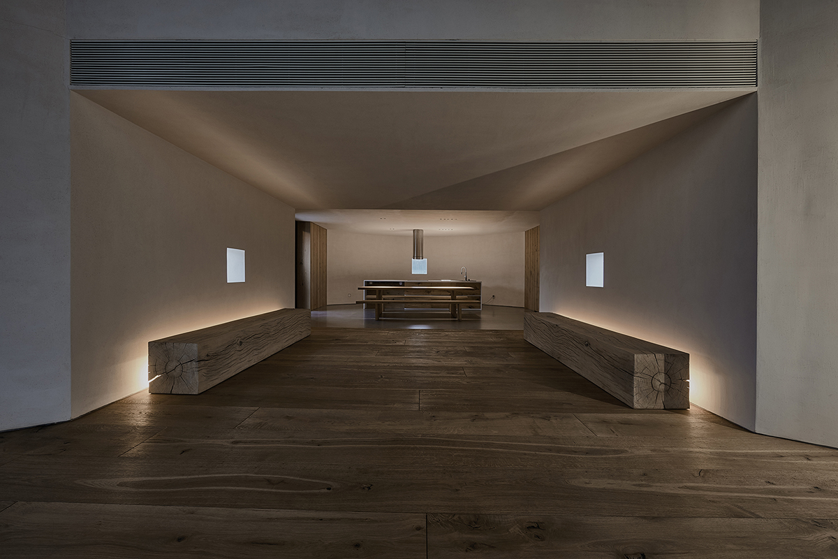 ZMY Design creates earth-toned interiors for a woodwork enthusiast’s house in Fujian, China