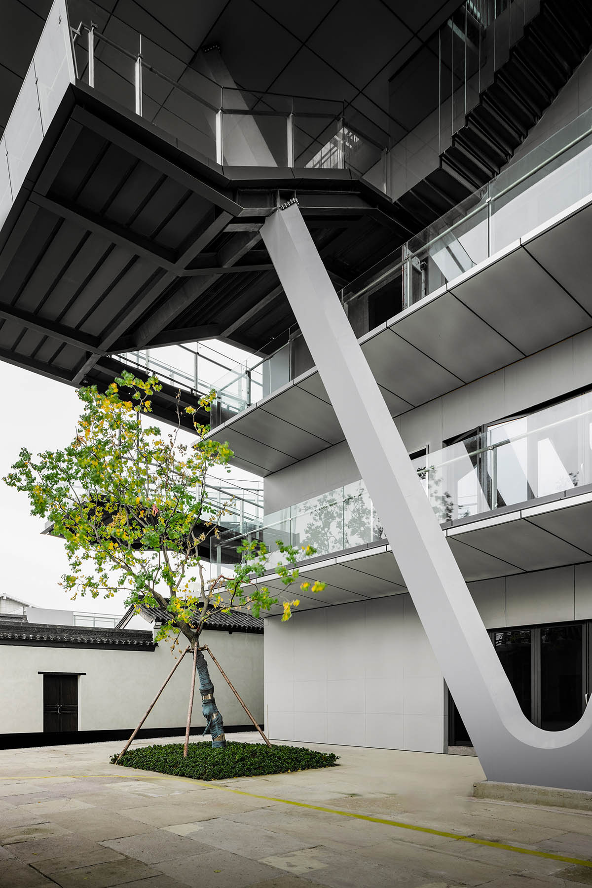 SpActrum completes cultural building with floating terraces and skywalks in Zhejiang, China 