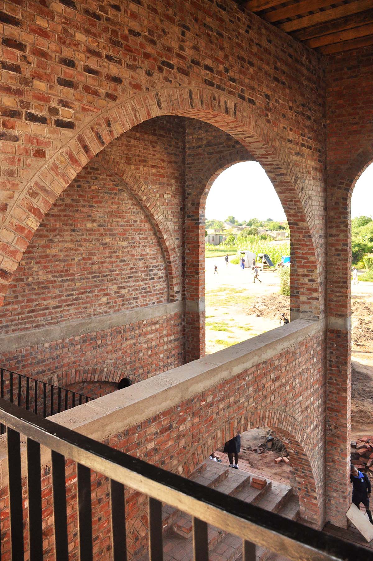 Zimbabwean primary school creates a sheltered walk under vaulted brick ceilings in Hopley