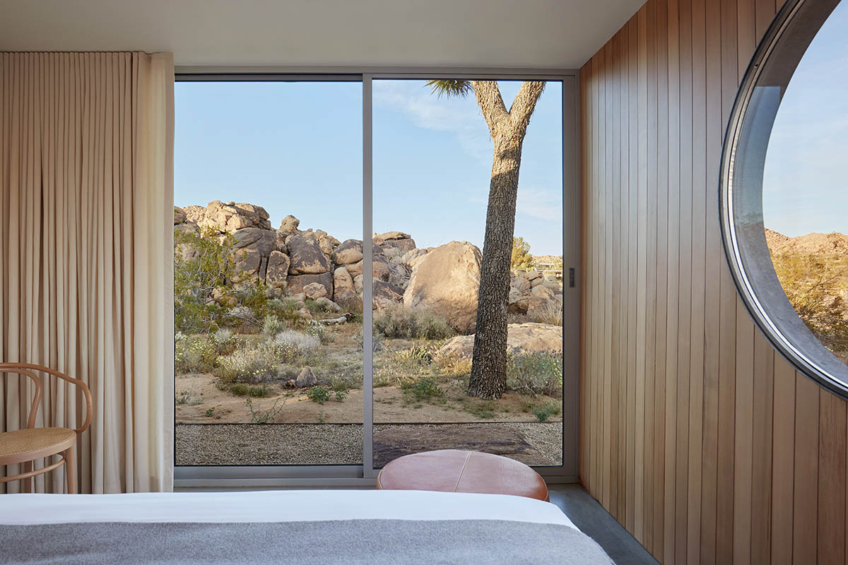 Industry of All Nations built a wooden pavilion in the rugged natural landscape of the Mojave Desert