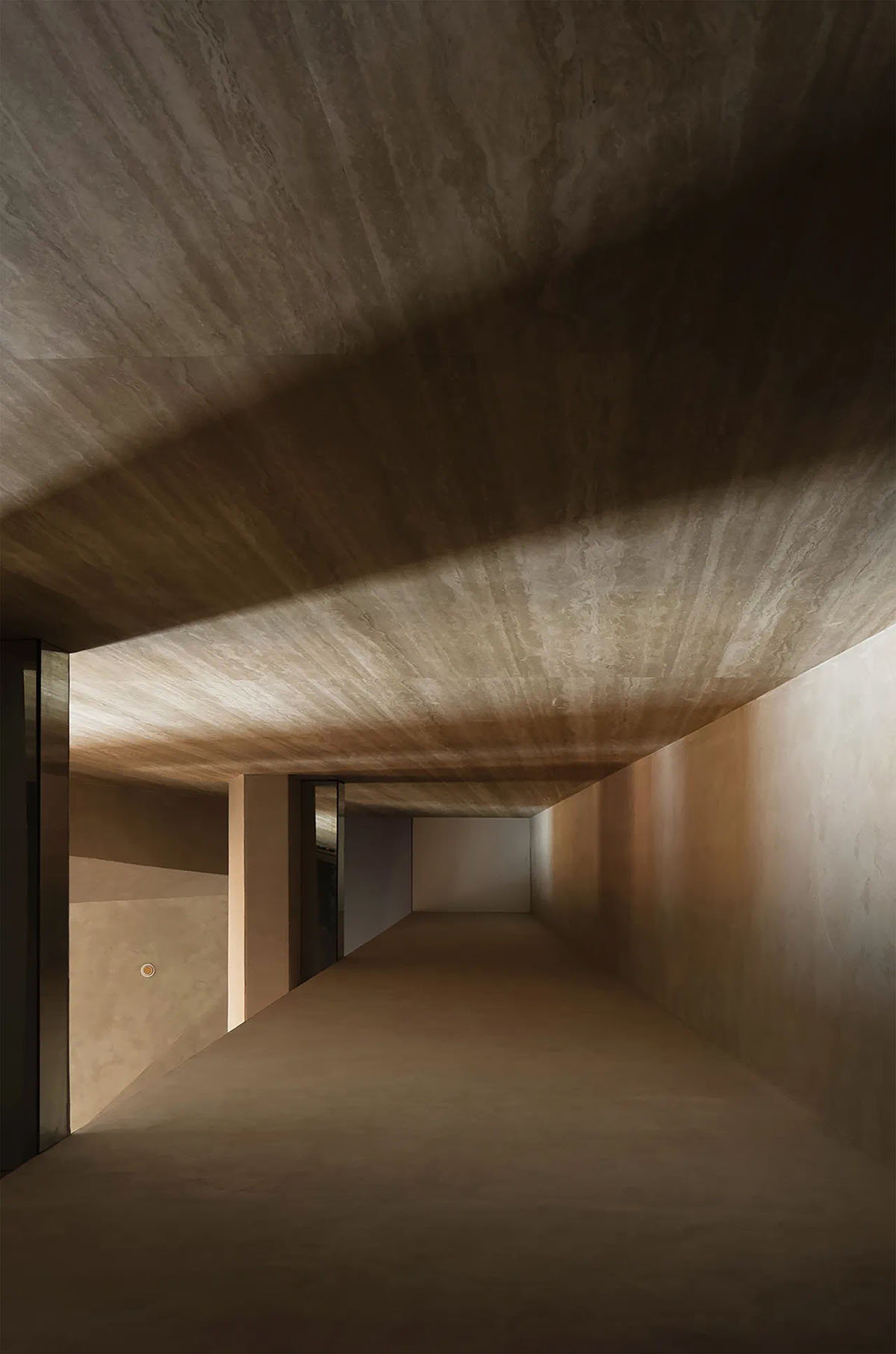 Exhibition hall interiors feature sharp angles and surfaces addressing diamond cutting processes