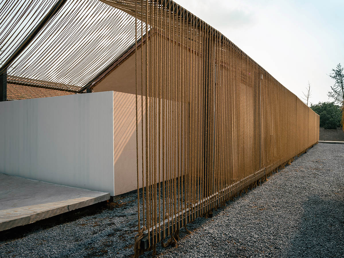 Domain Architects built boutique hotel with thatch roof and 60,000-metre hemp rope in rural Beijing