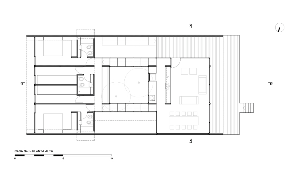 Partially open S+J family house by Luciano Kruk placed in the pine forest of Costa Esmeralda
