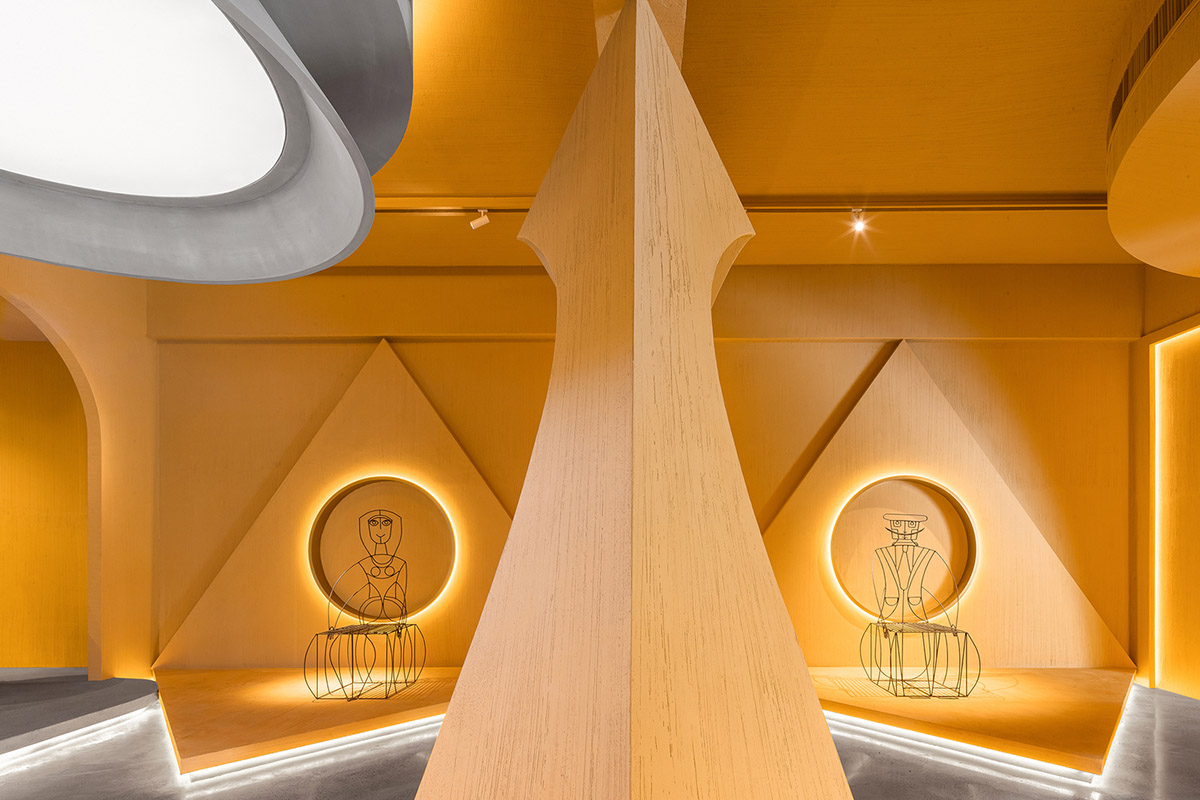 Angular corrugated stainless steel sheets form this showroom designed by PIG DESIGN in Hangzhou