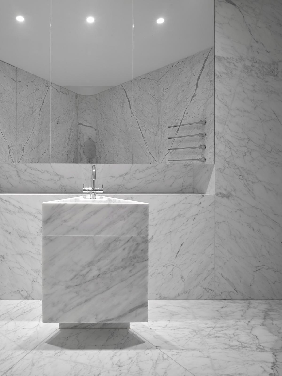 Elegant details and trefoil-shaped garden form this family house by Eldridge London in Coombe Park