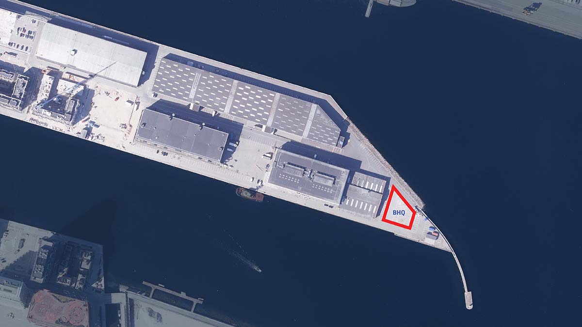 BIG designs its new HQ around one column and a giant staircase on Copenhagen harbor