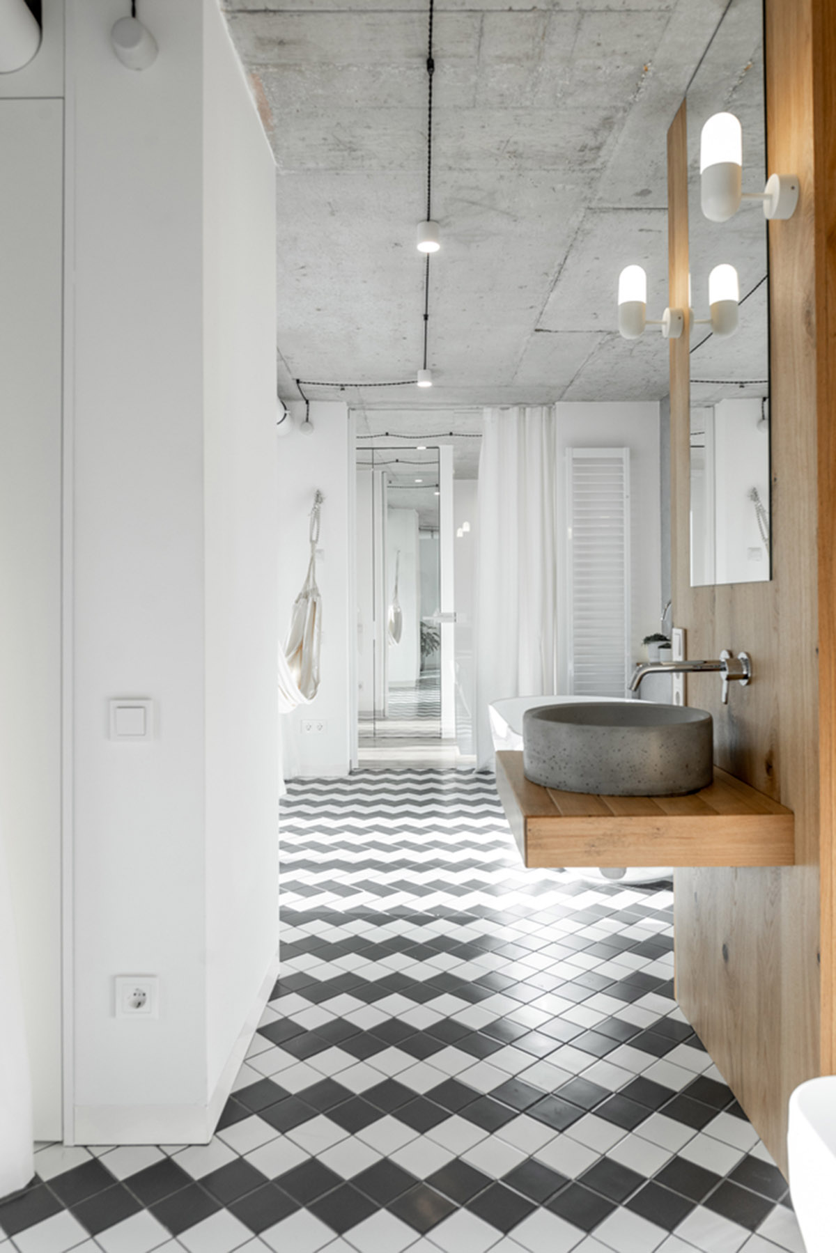 Metal framed-table, glass partitions, green infills make this interior space vivid and light in Lviv