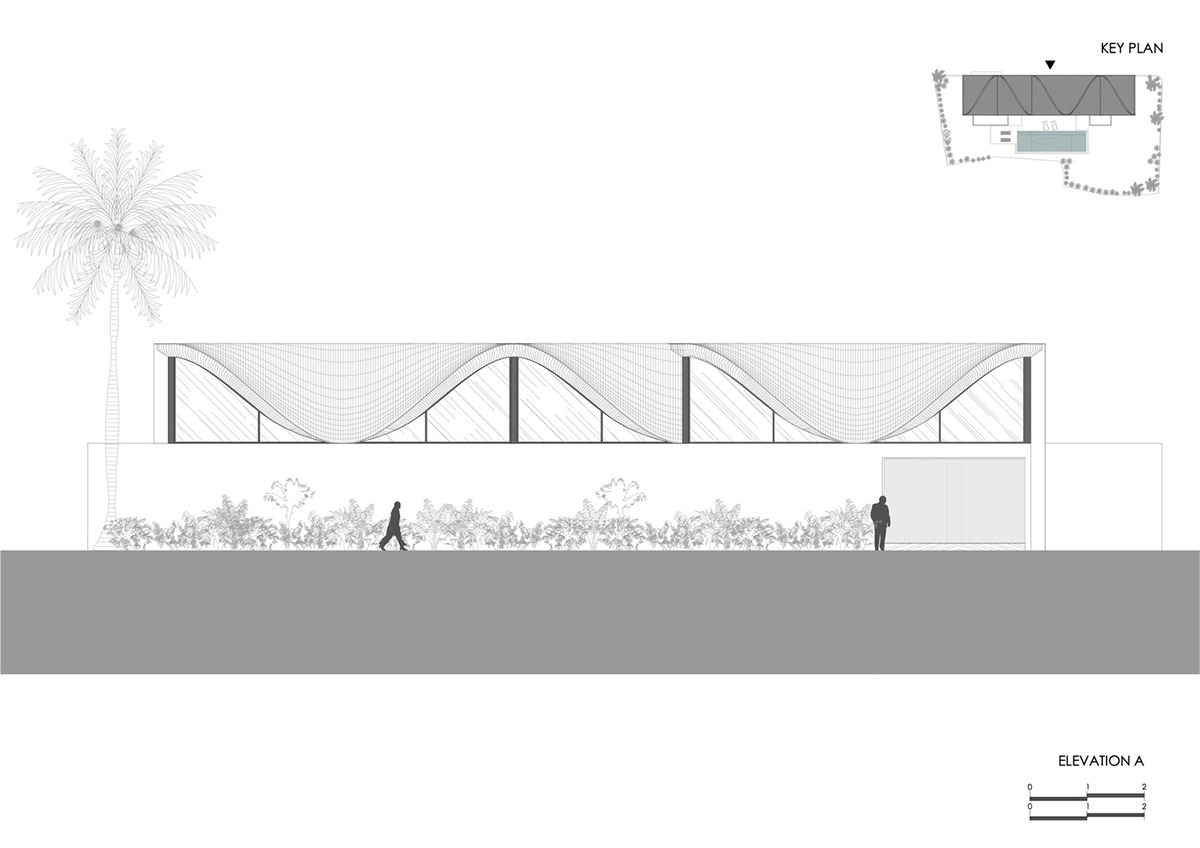 Twisted roof becomes walls and facade in Alpha House designed by Alexis Dornier in Bali