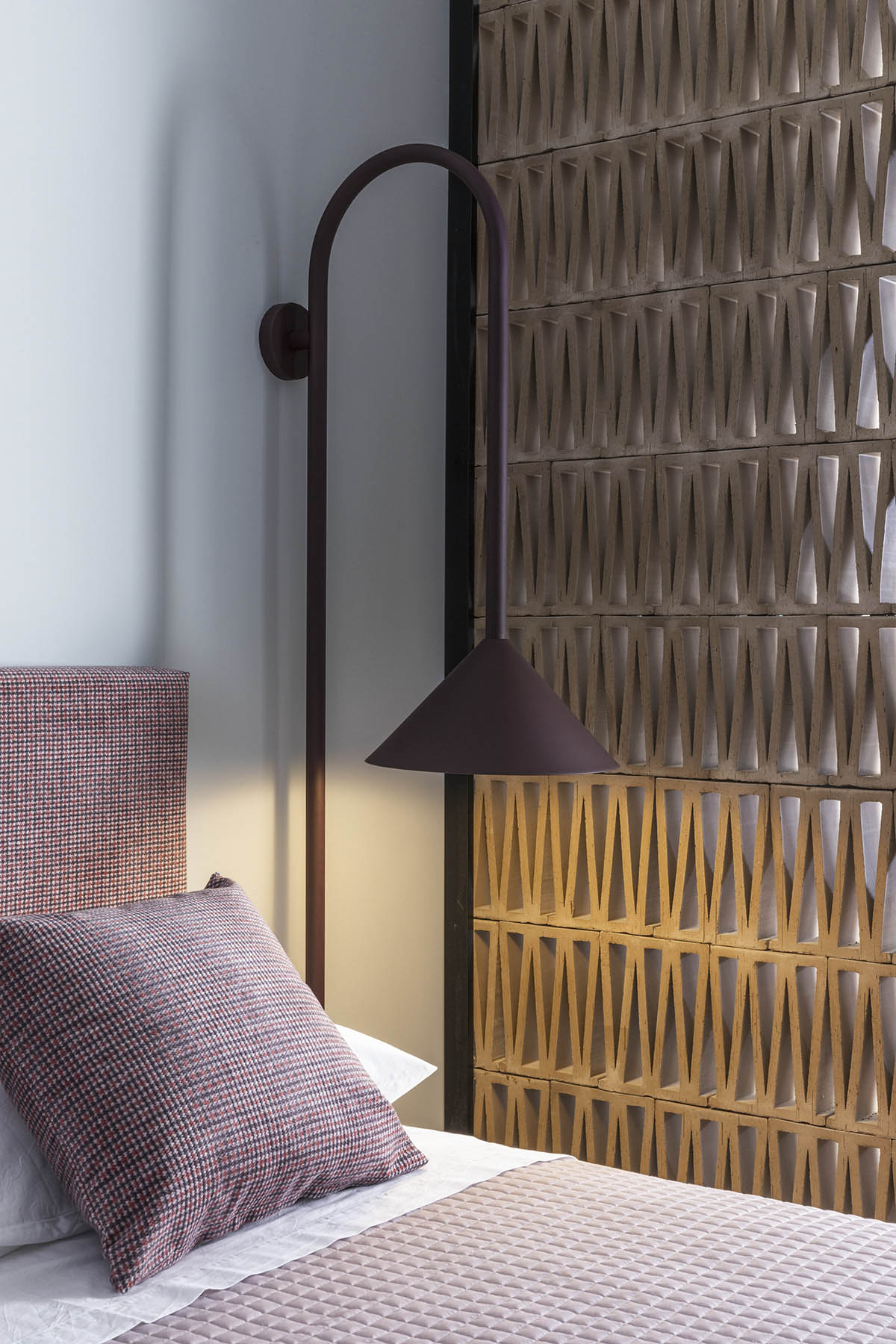 Totem House by STUDIOTAMAT is a rental home presenting cold shades and industrial looking in Rome 