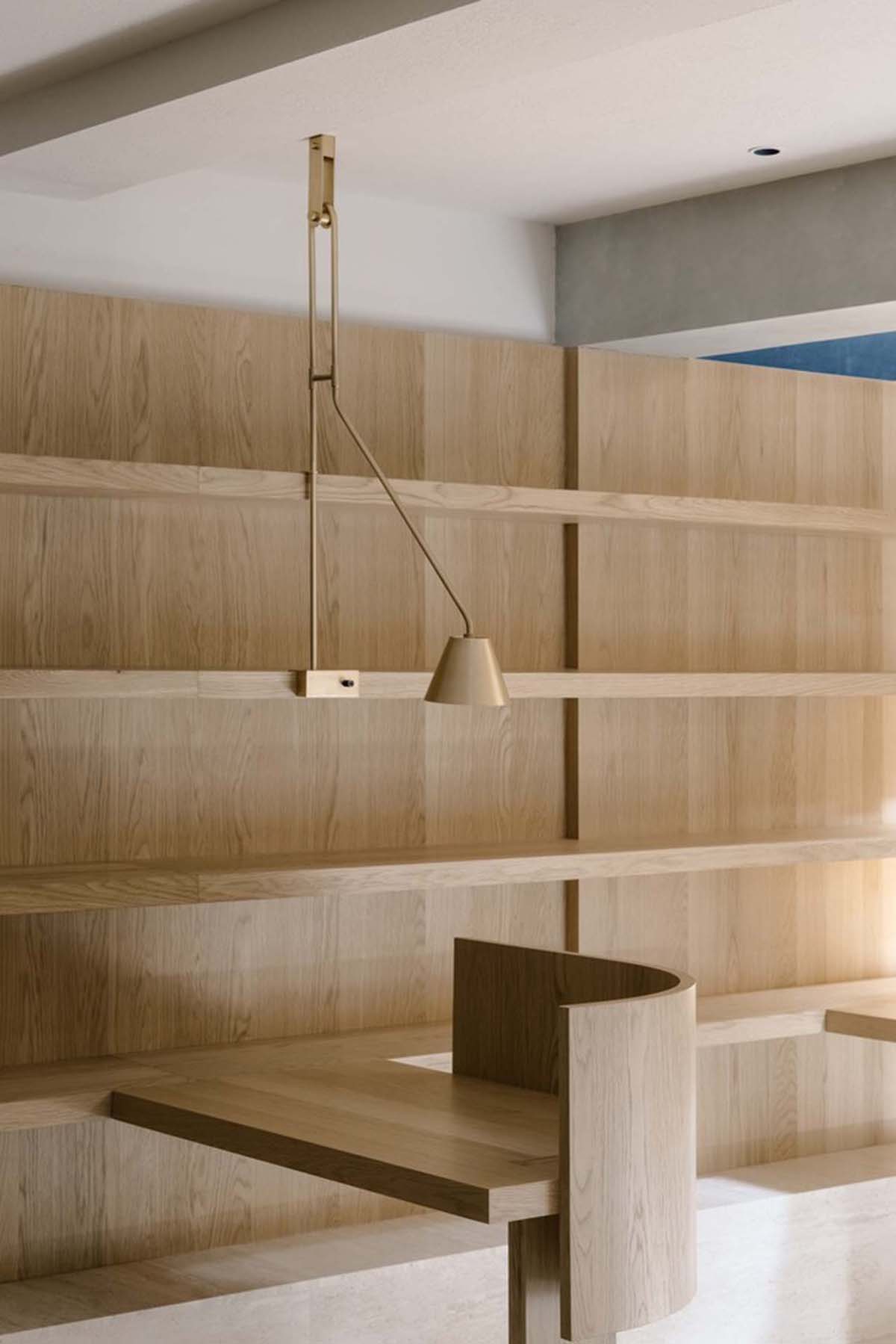 Atelier tao+c creates reading room with semi-circular bookshelves and timber structures in Shanghai 