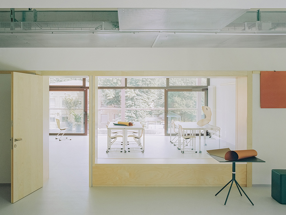 BDR bureau completes community school with pinkish steel framework in Turin