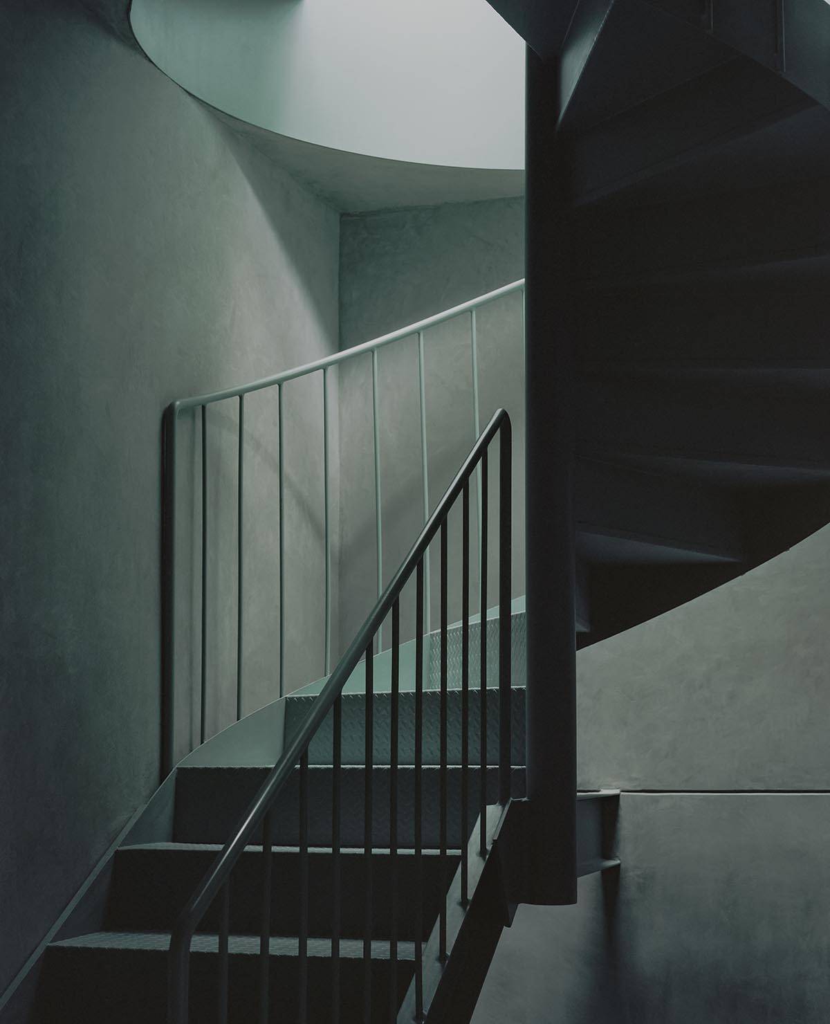 AMASA Estudio renovates 1940s house with green tones and central skylight in Mexico