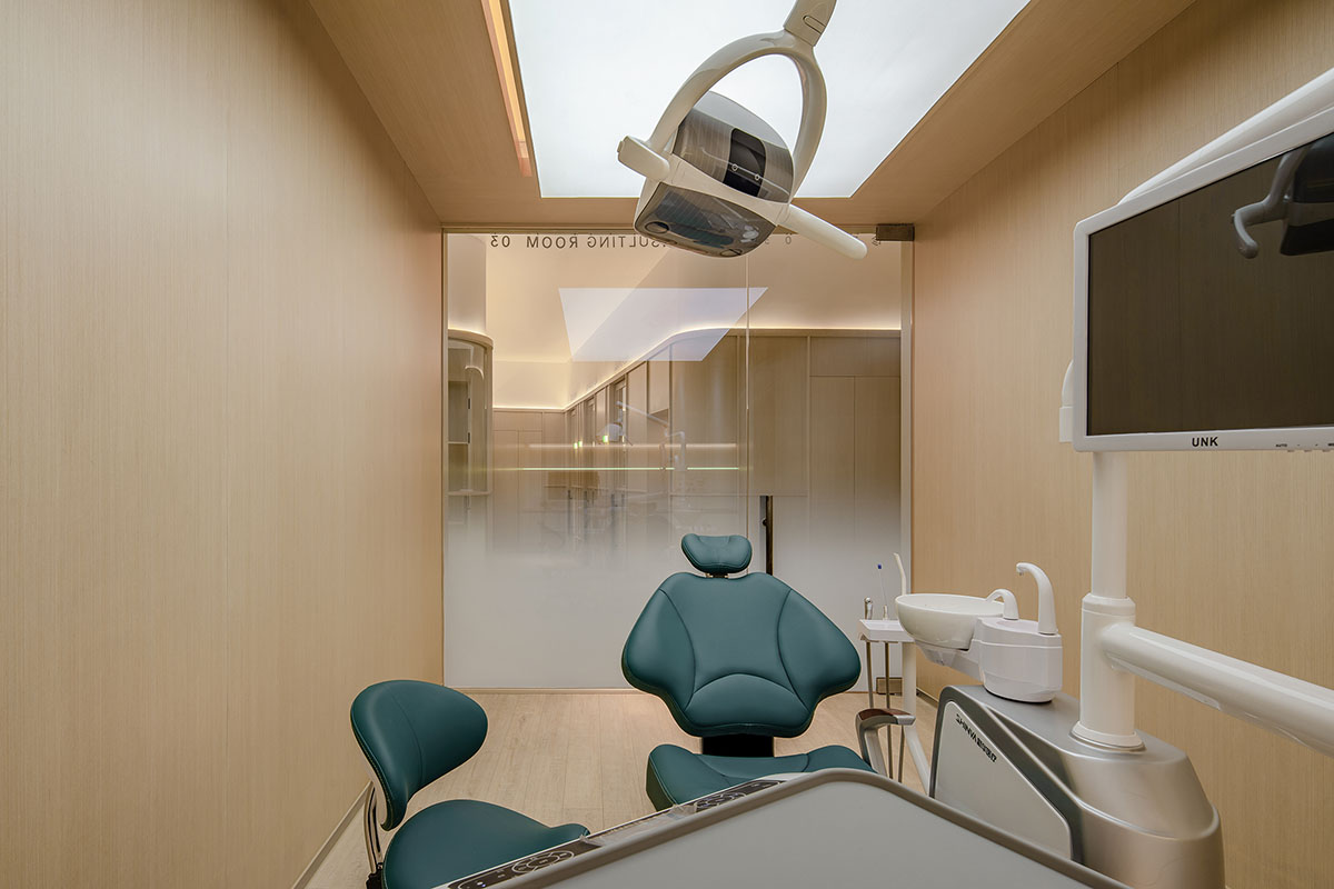 JACKY.W DESIGN completes dental clinic with rounded wooden walls and natural tones in China 