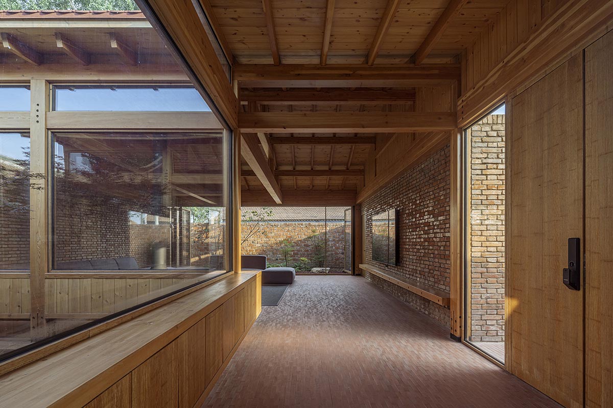 Archstudio renovates Beijing's old courtyard house with new wooden additions 