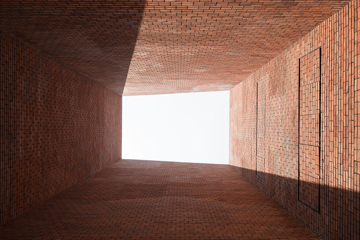 Roarc Renew repurposes old granaries as an art centre with flowing brick corridors in Jiaxing, China