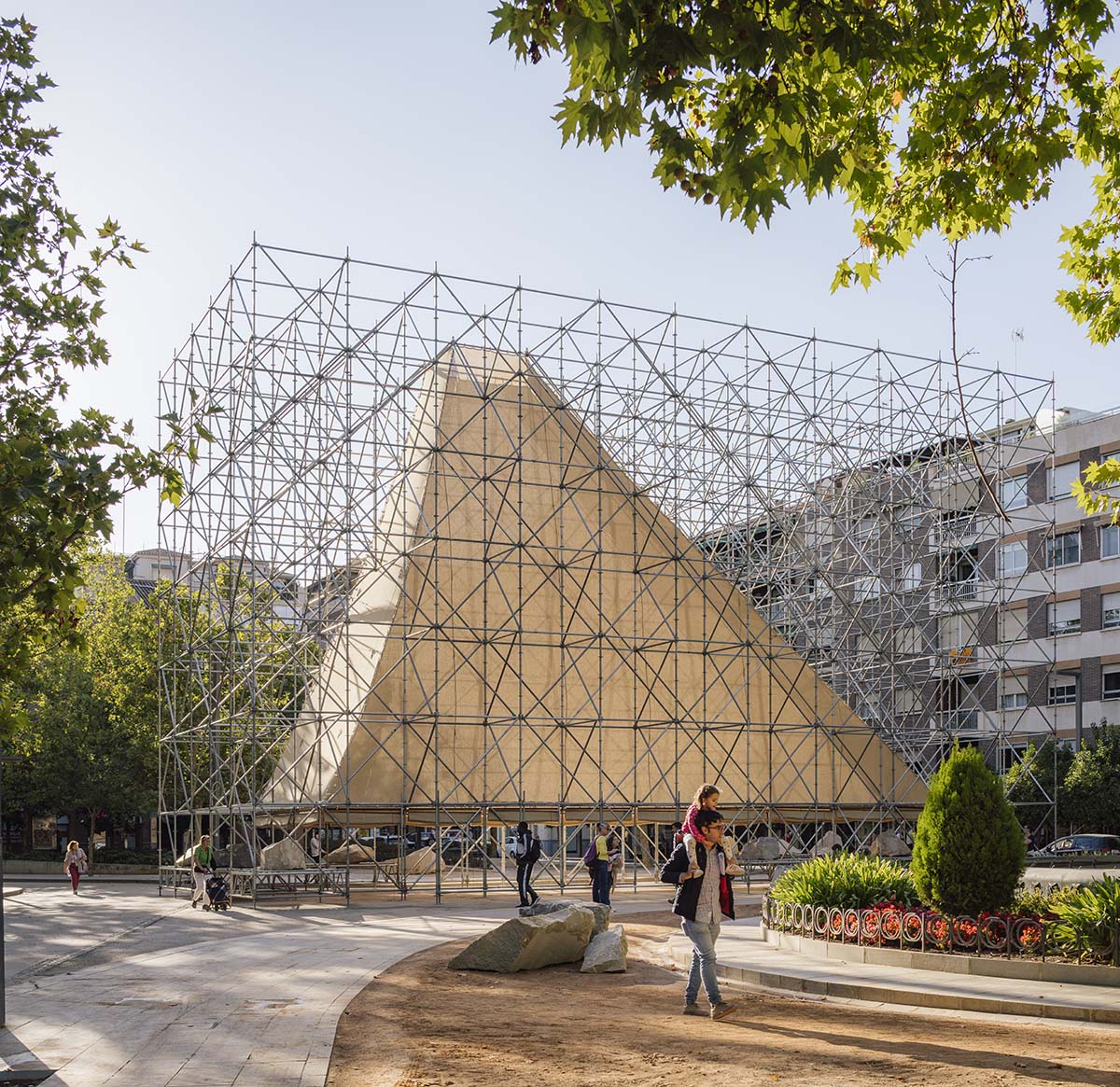 Aire Pavilion wrapped by giant scaffolding represents 