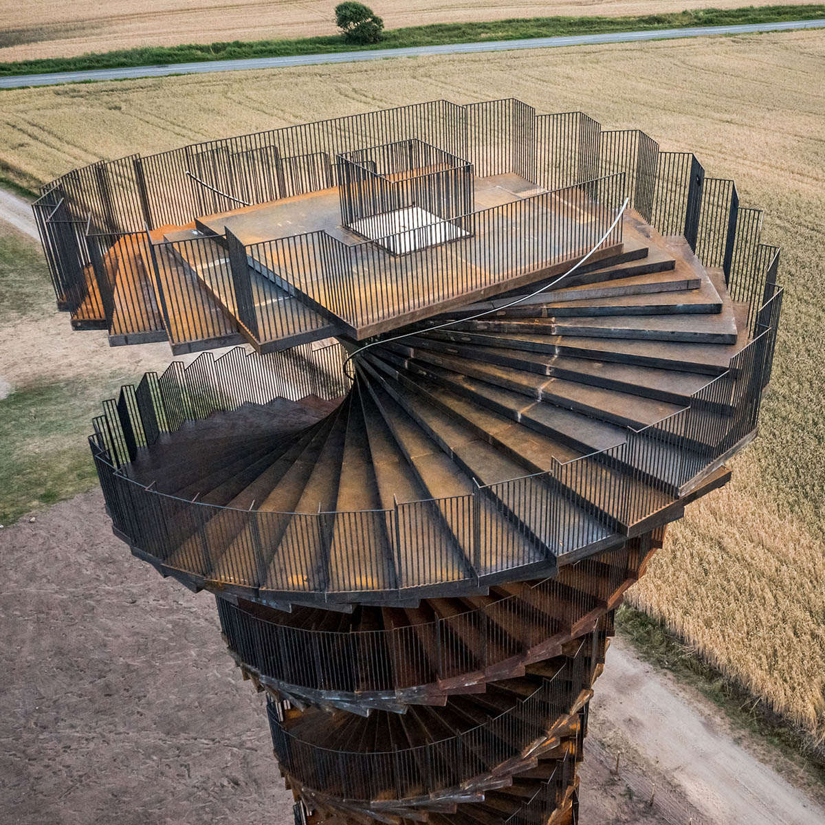 BIG completes corten steel double helix observation tower in Denmark&rsquo;s Wadden Sea National Park