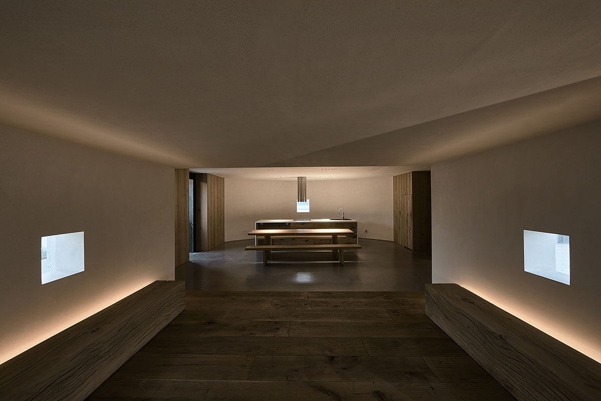 ZMY Design creates earth-toned interiors for a woodwork enthusiast’s house in Fujian, China