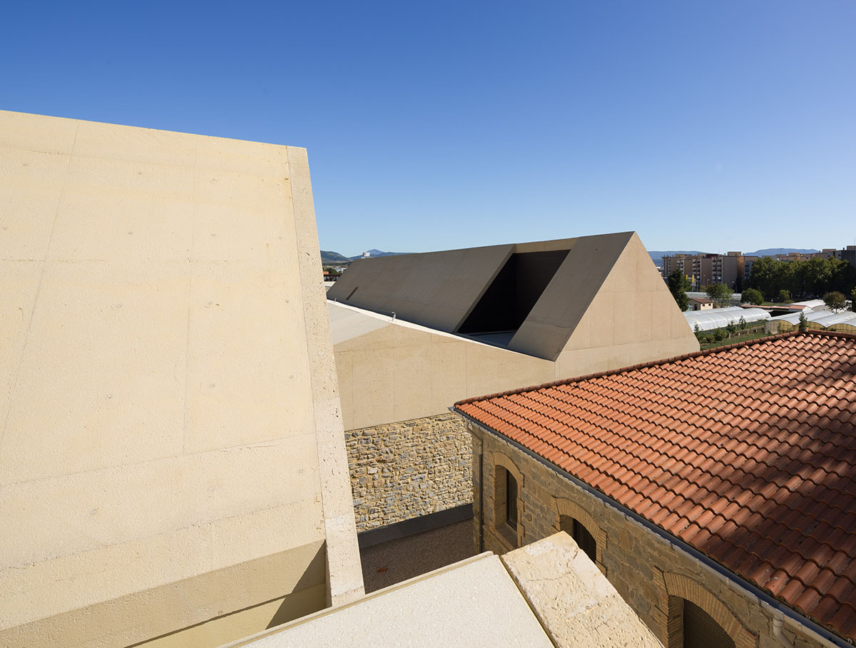 Vaillo+Irigaray Architects' pavilion-like Psychiatric Center is dissolved within historic buildings