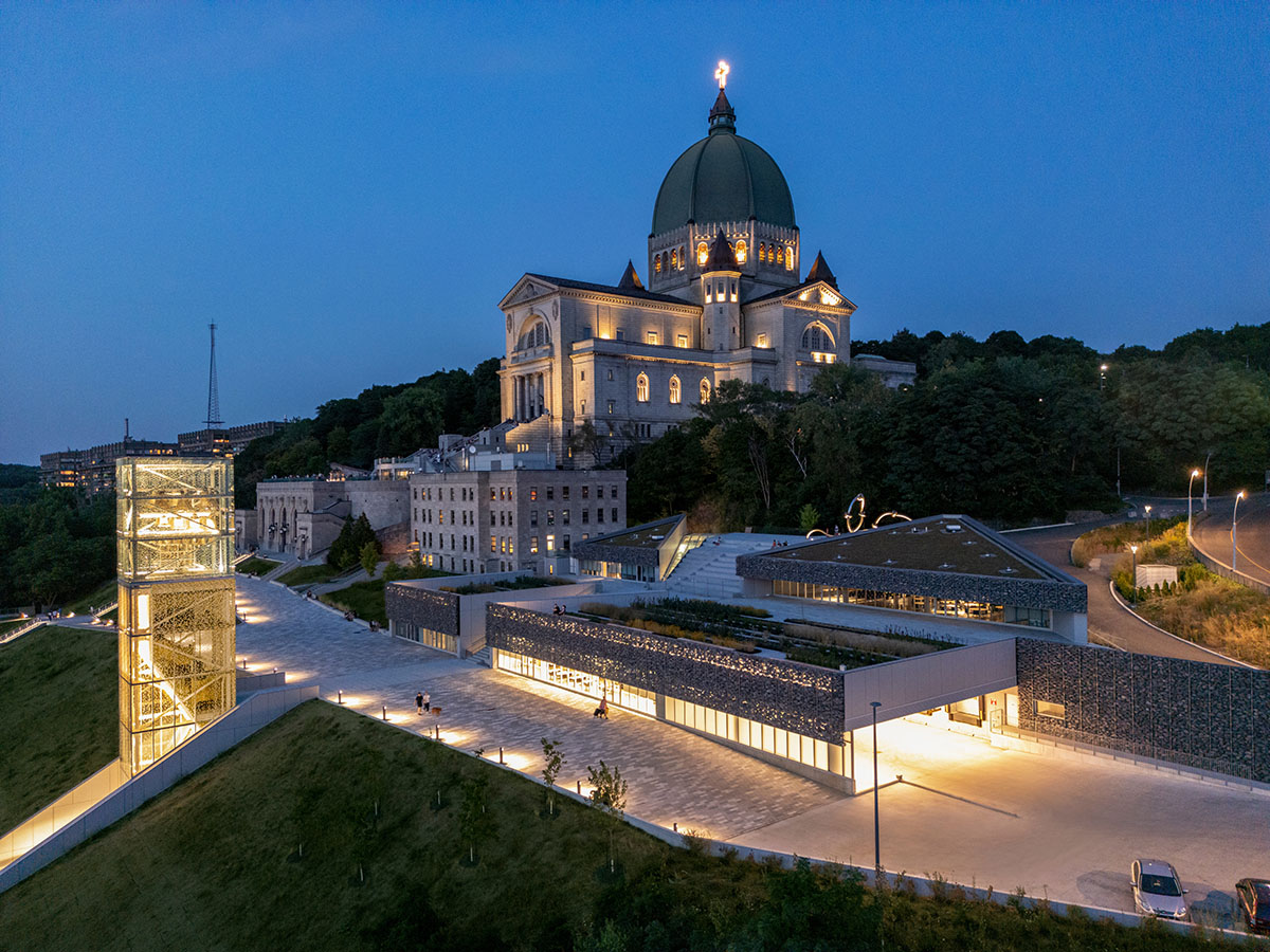 A striking bell tower pierces the sky, illuminating the grandeur of the pavilion in Montreal
