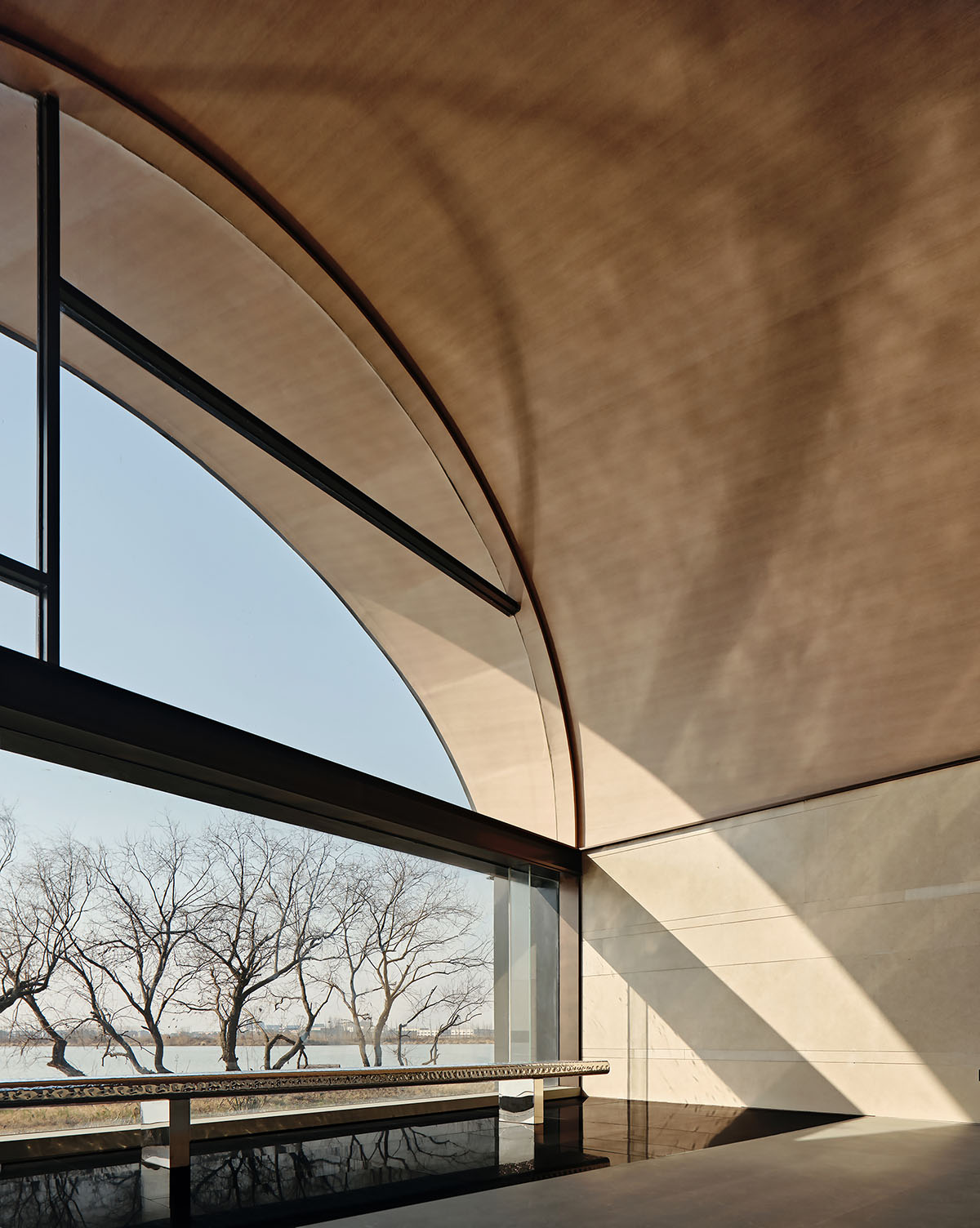 WJ STUDIO completes interiors of vaulted-roof Boatyard Hotel towards the river in Suzhou