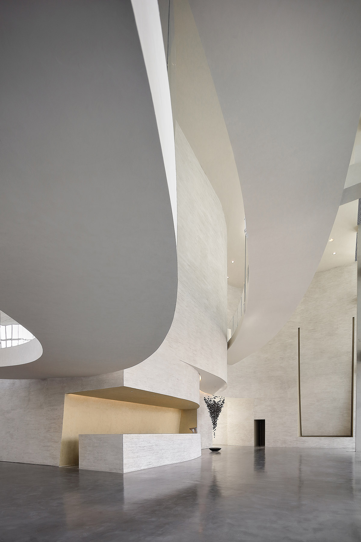 Waterfrom Design's art space features flowing walls to create