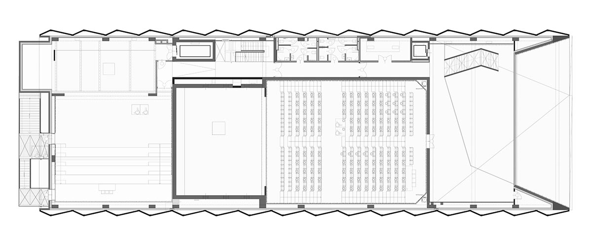 Teatro Borsoni theater is wrapped by façades that feature 3D-punctuated concrete blocks in Italy