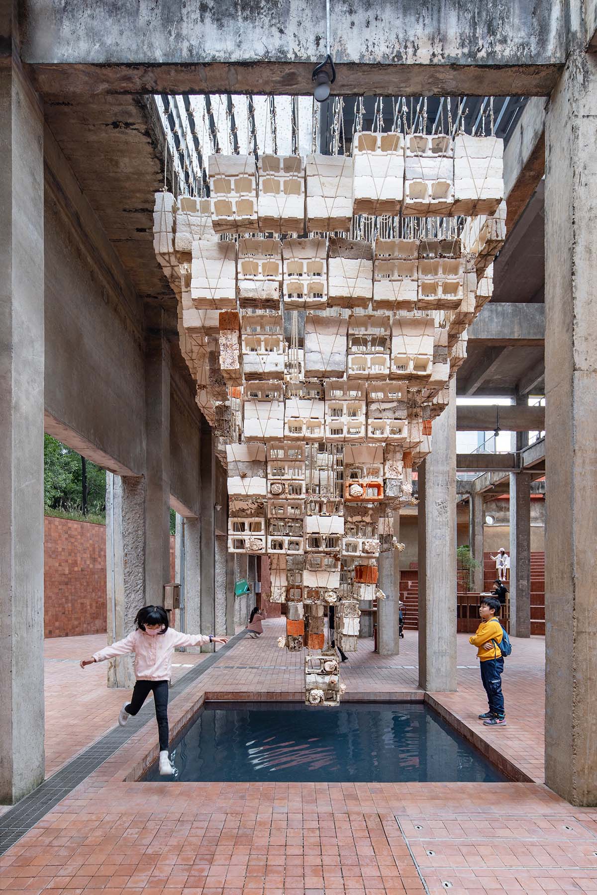 Mushroom brick pyramid in Shenzhen explores relationship between living organisms and architecture