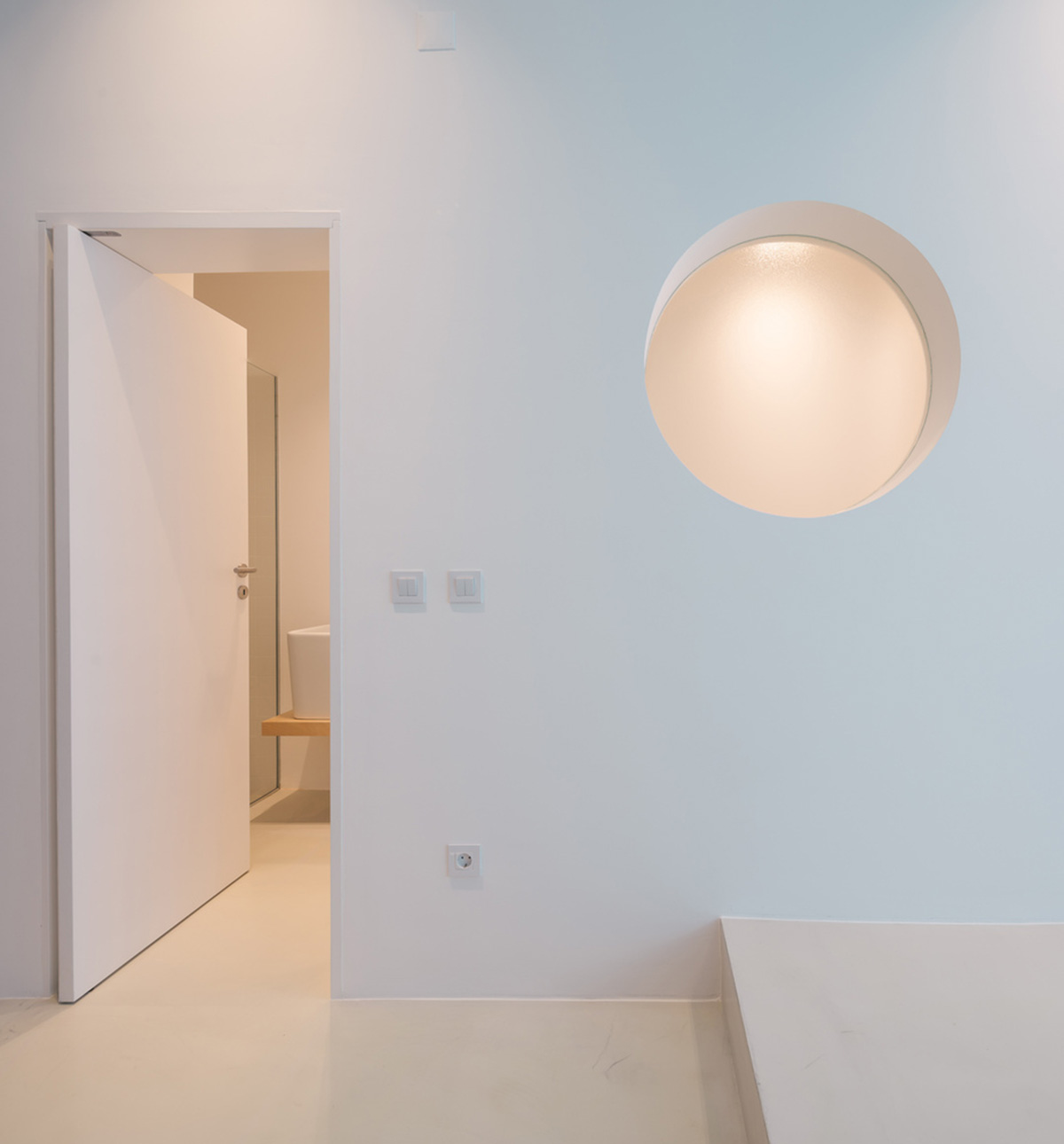 Verum Atelier redesigns old apartment with light-filled and airy interior space in Lisbon, Portugal