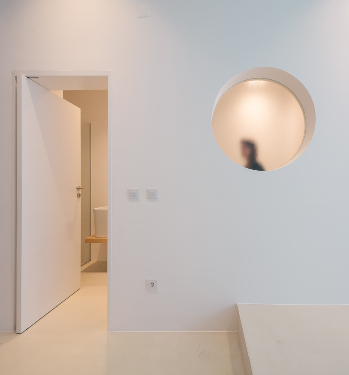 Verum Atelier redesigns old apartment with light-filled and airy interior space in Lisbon, Portugal